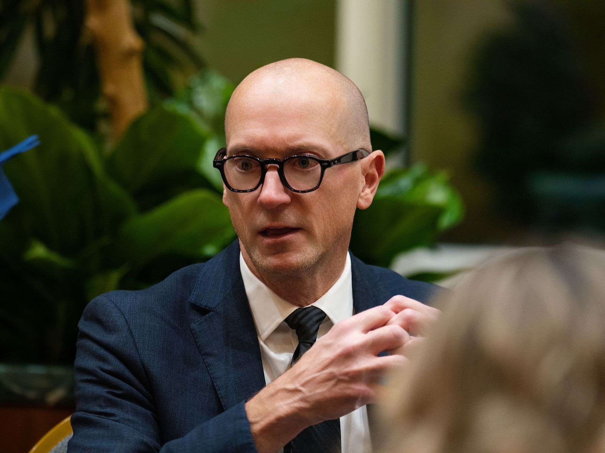 Guest in conversation at a corporate event